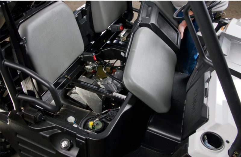 Liquid-cooled engine with radiator under the seat.